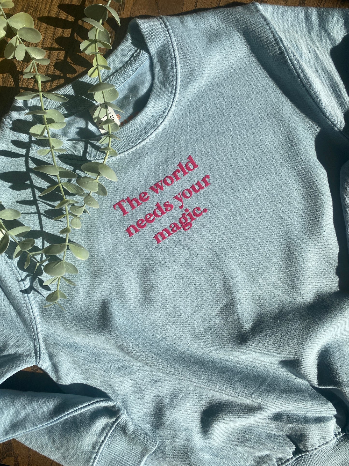 Trui lichtblauw - The world needs your magic