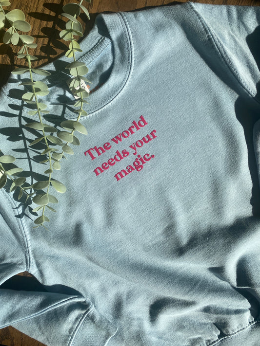 Trui lichtblauw - The world needs your magic