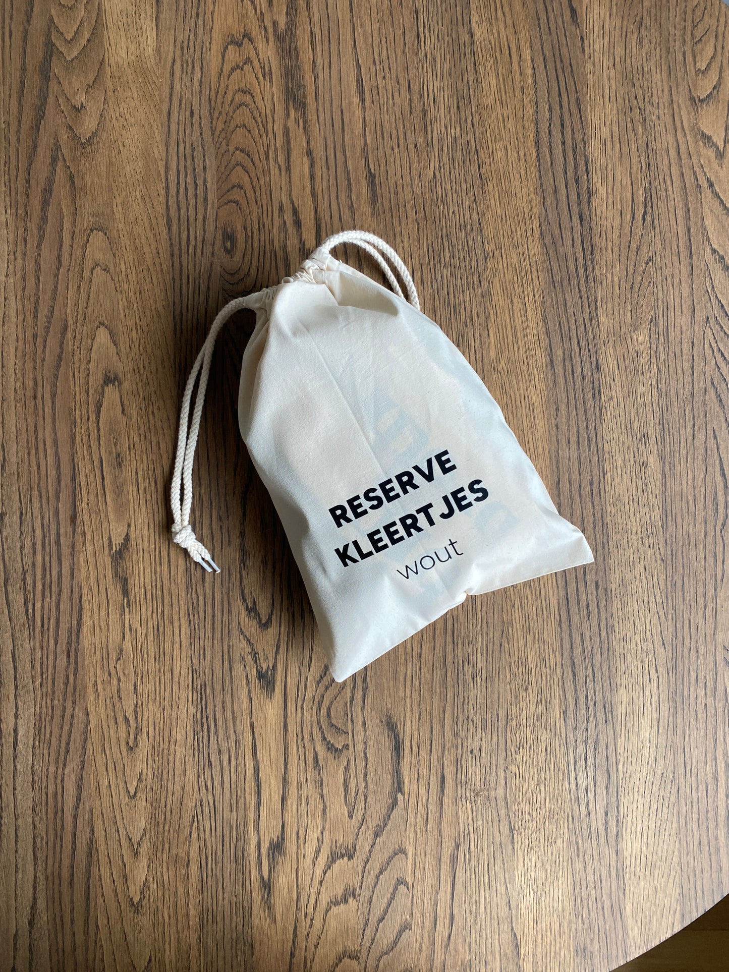 Gepersonaliseerd zakje reserverkleertjes