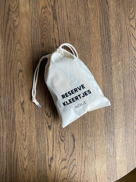 Gepersonaliseerd zakje reserverkleertjes