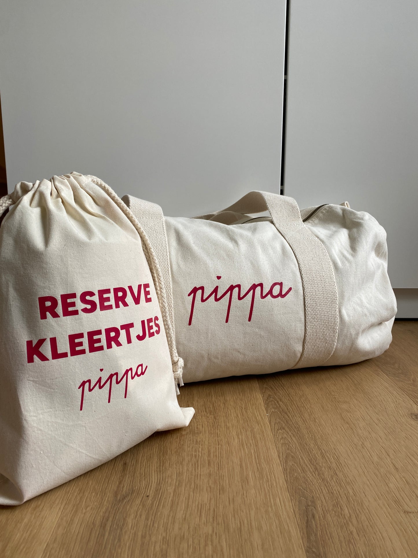 Gepersonaliseerd zakje reserverkleertjes